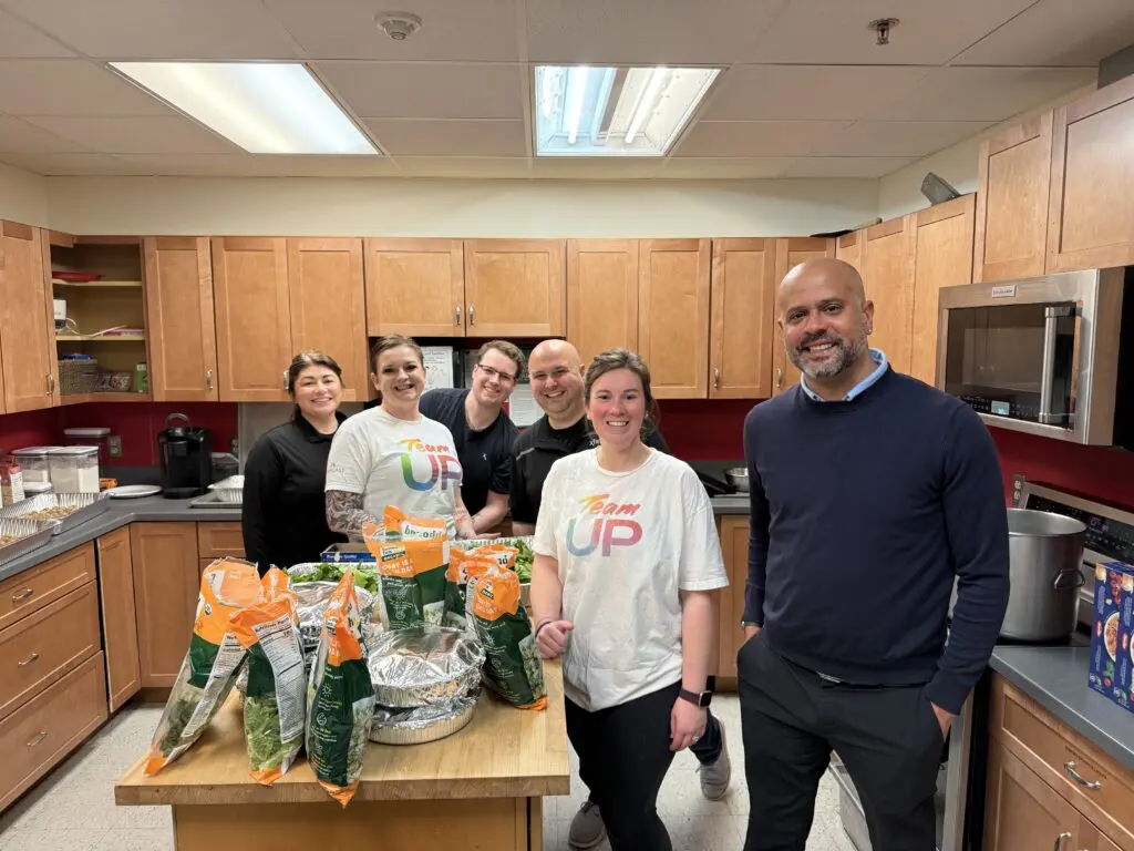 Team Up volunteers in a kitchen.