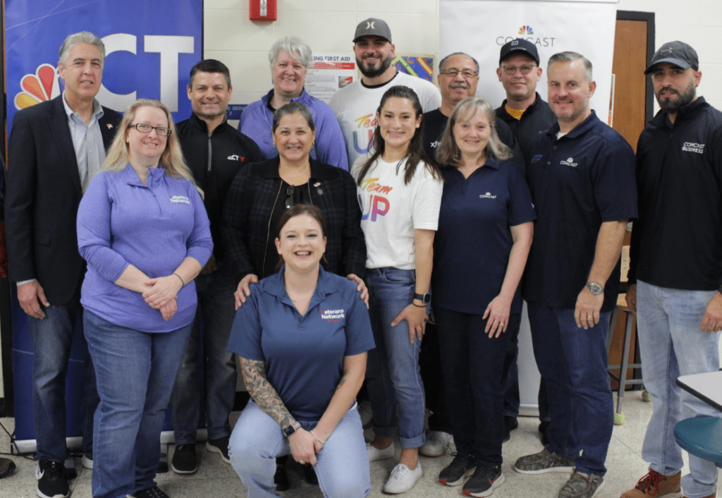 Comcast team at Boxes to Boots